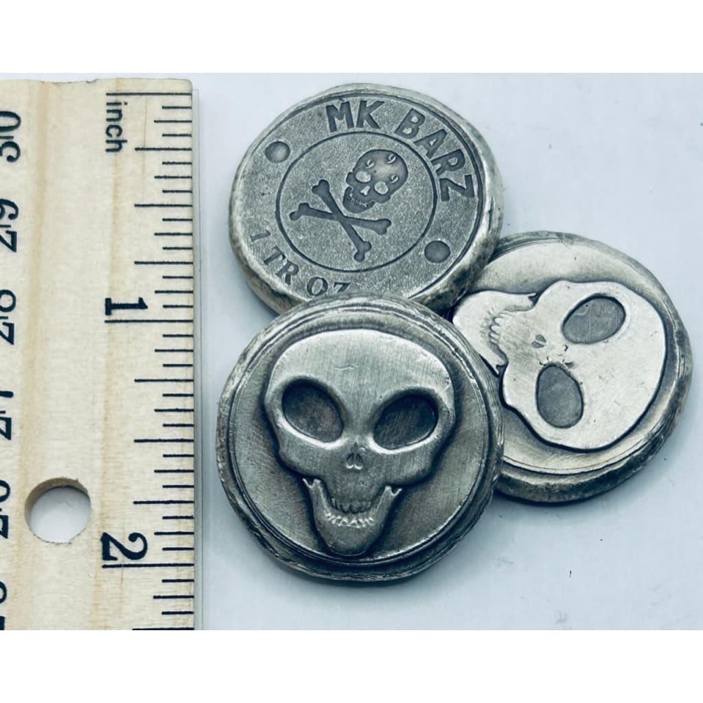 1 ozt MK BarZ Creepy Alien Head Stamped Round.999 fs