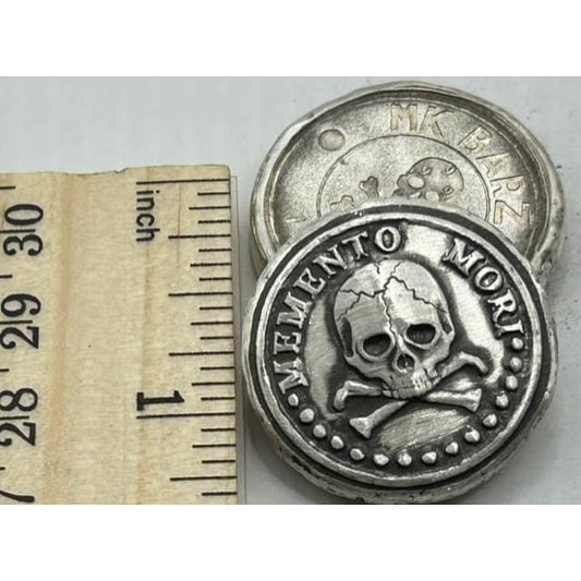 1 ozt MK BarZ Momento Mori Stamped Round.999 FS