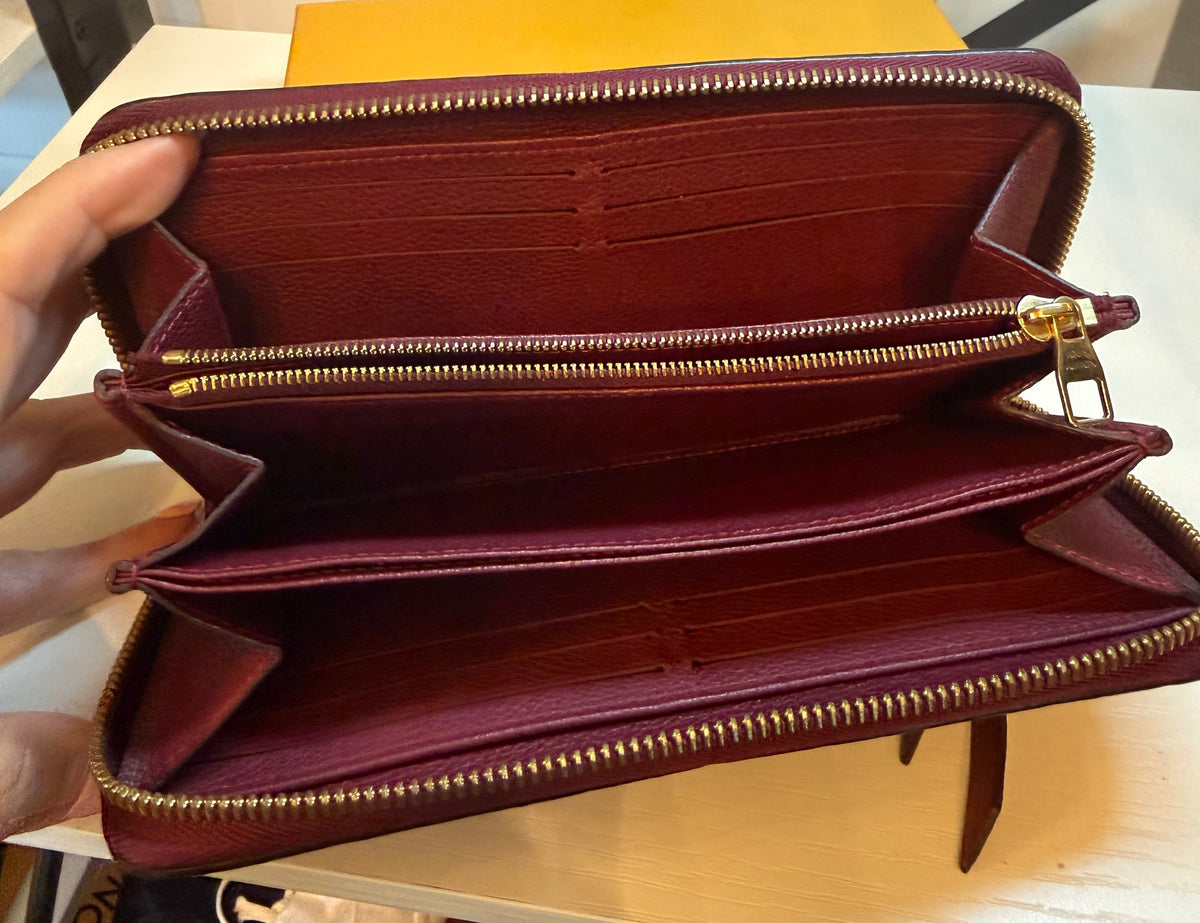 Louis Vuitton Monogram Empreint Zippy Wallet