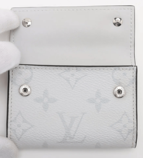 Louis Vuitton Taiga Lama Discovery compact wallet