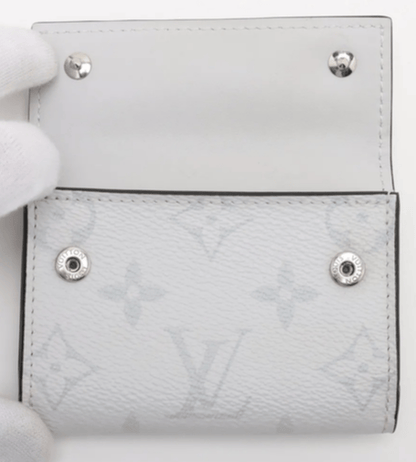 Louis Vuitton Taiga Lama Discovery compact wallet