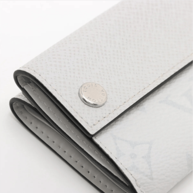 Louis Vuitton Taiga Lama Discovery compact wallet