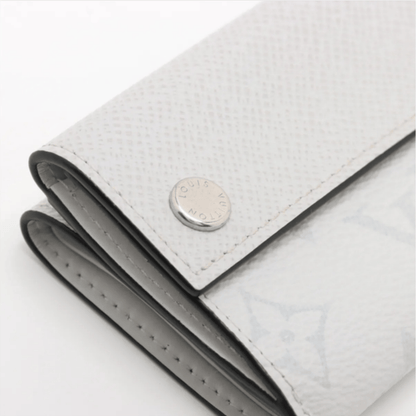Louis Vuitton Taiga Lama Discovery compact wallet