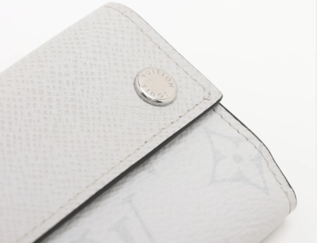Louis Vuitton Taiga Lama Discovery compact wallet