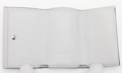 Louis Vuitton Taiga Lama Discovery compact wallet