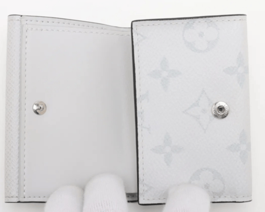 Louis Vuitton Taiga Lama Discovery compact wallet