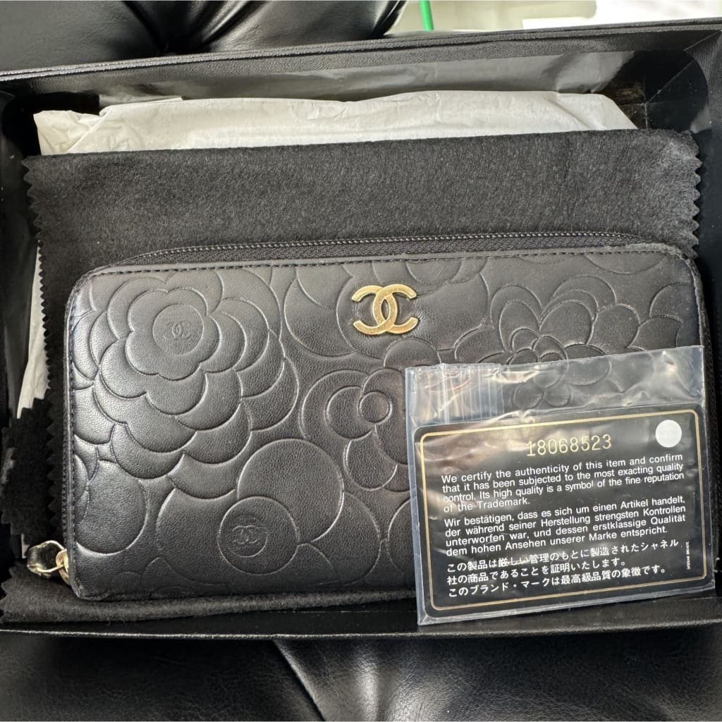 Chanel Lambskin Camellia Embossed Large Zippy Wallet Black - Black / Leather / Long Wallet