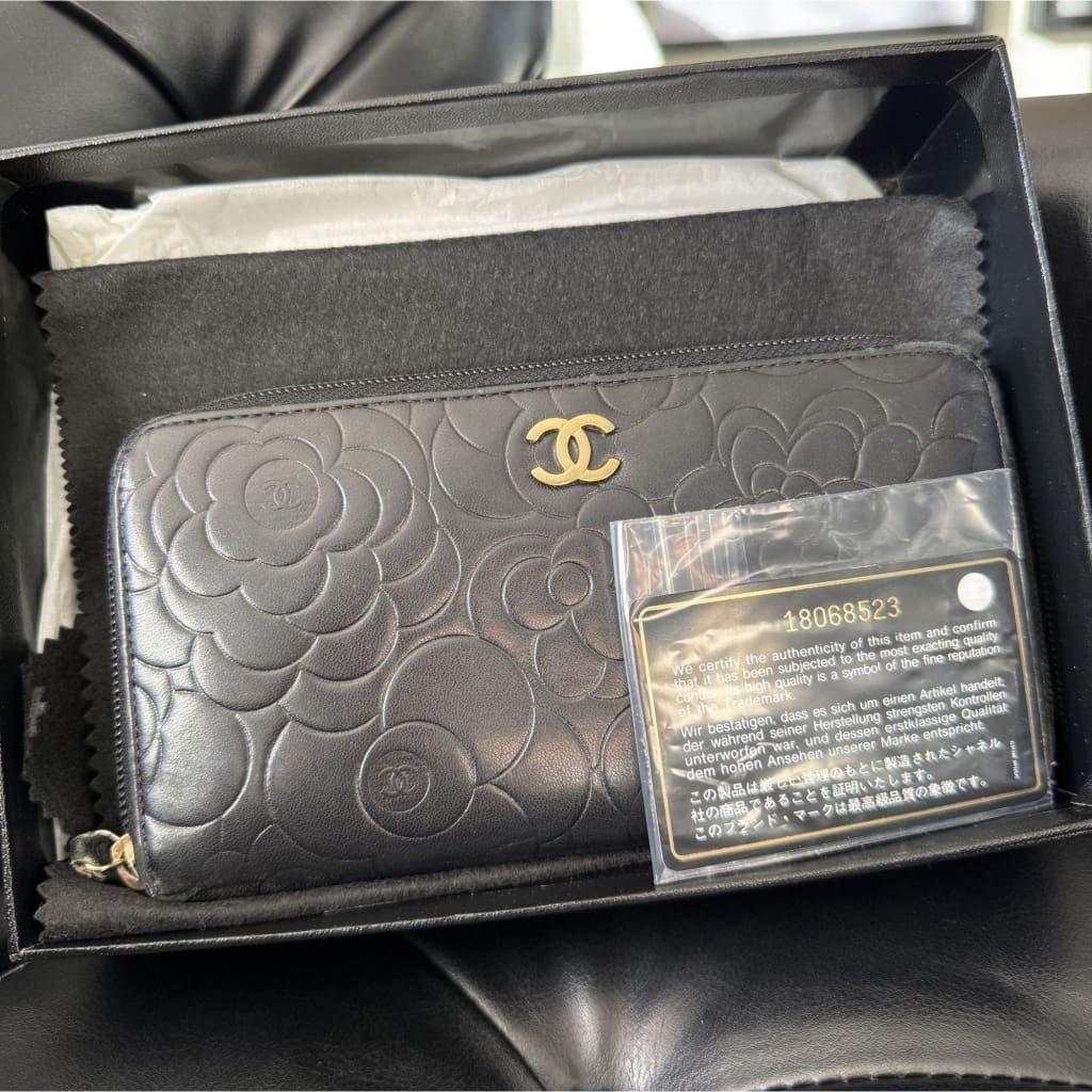 Chanel Lambskin Camellia Embossed Large Zippy Wallet Black - Black / Leather / Long Wallet