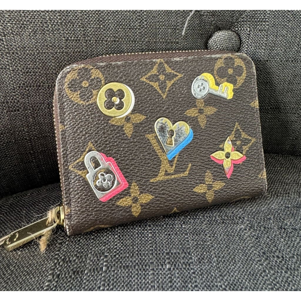 LOUIS VUITTON Limited Edition Monogram Love Lock Zippy Coin Case - Compact / Brown / Coated Canvas