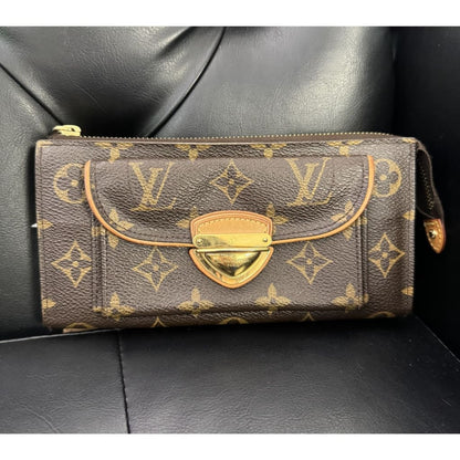 Louis Vuitton Monogram Astrid Oversized Wallet - brown / Coated Canvas